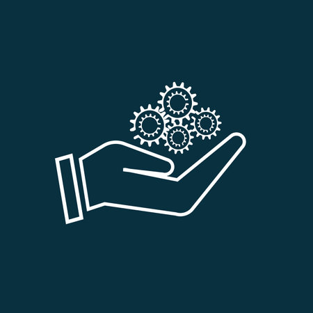 white color gear icon on white color hand with background .の写真素材