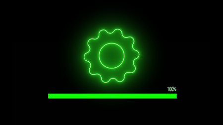 Glow green color completed loading bar and gear wheel on black backgroundの写真素材