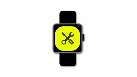 Smartwatch with a yellow repair tool icon on the screen on a white background.の写真素材