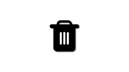 Black silhouette of a dust bin icon on a white background.の写真素材