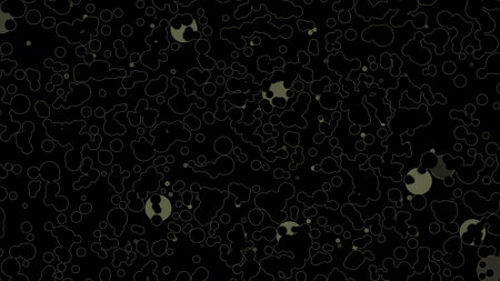 Abstract black background with gold dust particles and bokeh lights.