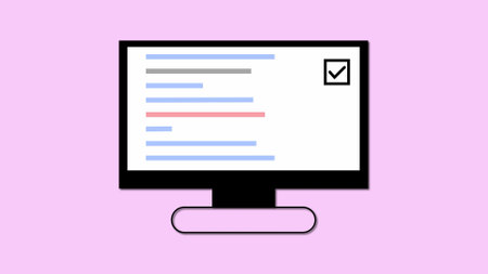 Computer monitor displaying a checklist with a tick mark on a pastel pink background.の写真素材