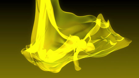 Abstract yellow flowing fabric on a dark background.の写真素材