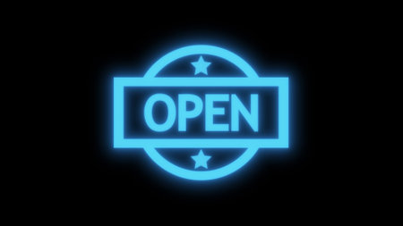 Neon Open sign with stars on a black background.