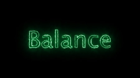 Neon sign with the word Balance glowing in green on a dark background.の写真素材