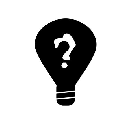 Black light bulb silhouette with question mark on a white background.の写真素材
