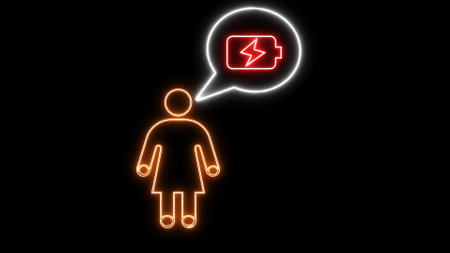 Neon person with speech bubble containing a battery icon on a black background.の写真素材