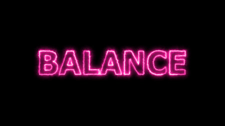 Neon sign with the word BALANCE illuminated in pink dark background.の写真素材