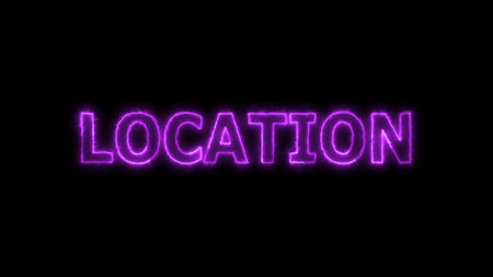 Location text with neon glowing on a black background.の写真素材