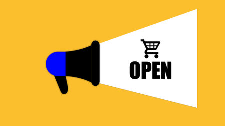 Megaphone with OPEN and shopping cart icon on a yellow background.の写真素材