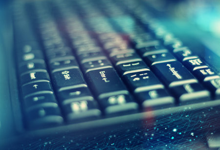 Computer keyboard with a blue tint and soft focus.