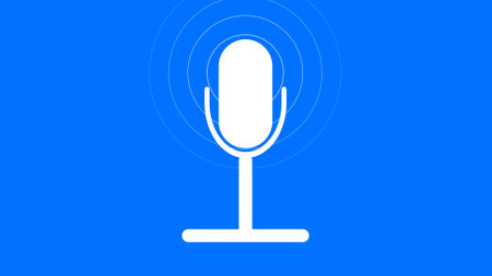Microphone icon on a blue background.の写真素材
