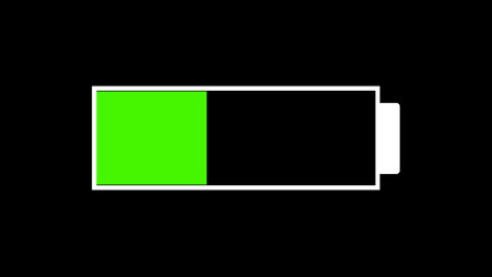 Low battery icon with red indicator on black background.の写真素材
