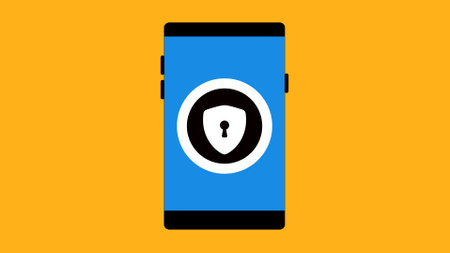 Smart phone with lock icon on a yellow background.の写真素材