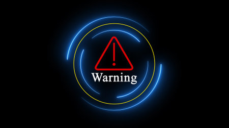 Neon circle with the word warning in the center against dark background.の写真素材