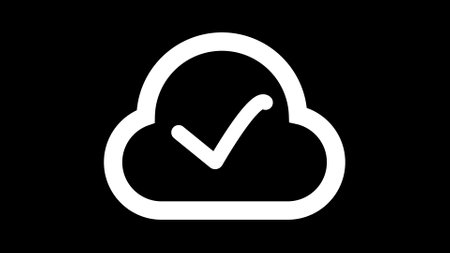 Cloud icon with checkmark animated on black background.の写真素材