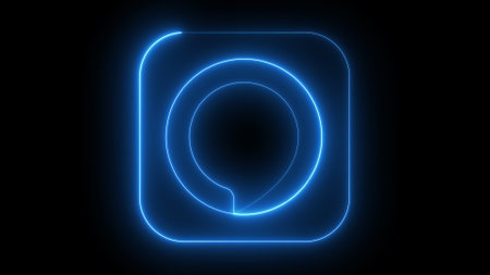 A glowing neon blue icon on a black background, featuring a circular design with a small cutout at the bottom.の写真素材
