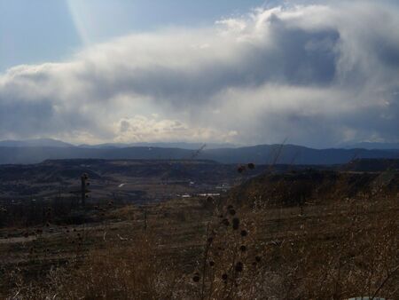 Snowstorm building over Rocky Mountainsの写真素材