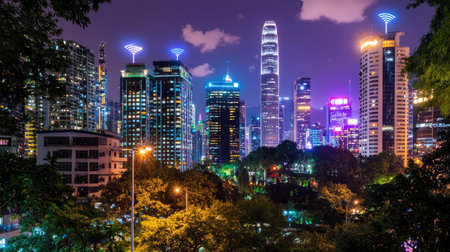 A stunning nighttime cityscape showcasing vibrant lights and modern architecture. The scene captures the fusion of technology and nature amidst urban life.の素材