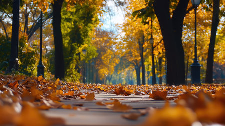 A tranquil autumn pathway adorned with fallen golden leaves and vibrant trees, inviting viewers to embrace the serene beauty of the season.の素材
