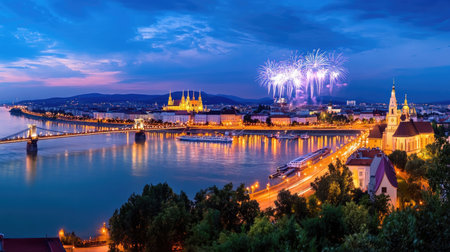 A stunning city skyline at night showcasing vibrant fireworks over a river, reflecting lights from bridges and buildings, perfect for travel and celebration themes.の素材