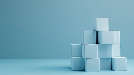 Layered 3D blocks demonstrating a cost structure concept on a clean surface, copy space.の素材