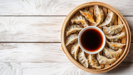 Top view of Chinese dumplings with soy dipping sauce, ample room for copyの素材