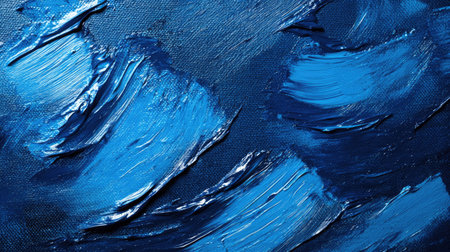 A top-down view of blue paintbrush strokes across a canvas, showcasing a range of blue hues and brush texturesの素材