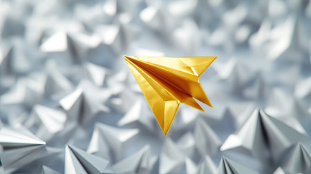 Gold paper plane ascending gracefully, surrounded by silver and white planes falling away in the backgroundの素材