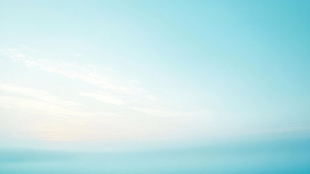 Light blue gradient background with a serene and calming appearanceの素材