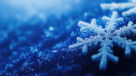 This stunning close-up captures a frosted snowflake resting delicately on a blue surface, showcasing the intricate details of winter's beauty and tranquility.の素材