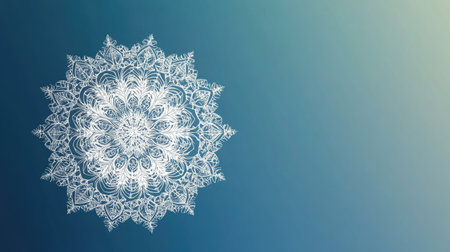 This elegant mandala design features intricate patterns in white against a soft blue gradient background, creating a tranquil and soothing aesthetic for any project.の素材