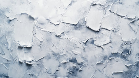 A textured stone wall in light silver-grey tones, with subtle blue and white hues, perfect for a minimalist backgroundの素材