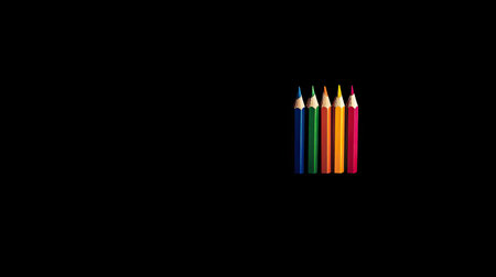 A stunning display of vibrant colored pencils arranged on a black background, perfect for art projects and educational purposes. Ideal for inspiring creativity.の素材