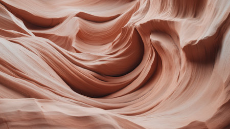 Experience the mesmerizing beauty of smooth sandstone curves found in Arizona's stunning slot canyon, showcasing nature's intricate designs and warm colors.の素材