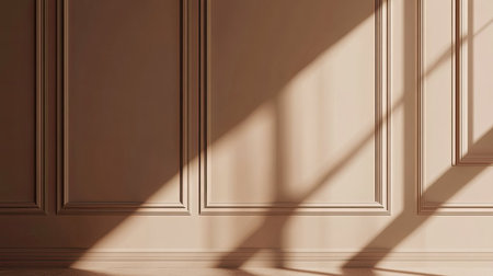 This serene image captures the subtle play of light and shadow on a beautifully designed beige wall. The elegant paneling adds depth and a modern touch to any interior space.の素材