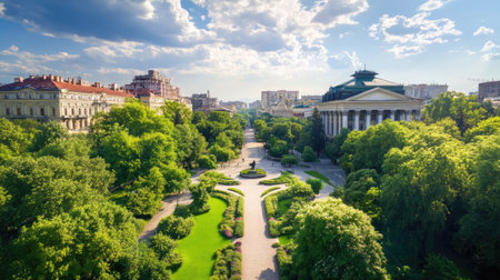 A breathtaking view of a city park filled with lush greenery and trees under a picturesque cloudy sky, creating a tranquil atmosphere for relaxation and exploration.の素材