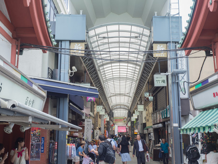 SENSOJI TEMPLE, JAPAN- JUNE 29, 2015: Asakusa or Sensoji temple is very popular Buddhist temple, built in the 7th century. The temple is approached via the Nakamise, a shopping street that providing local snacks and tourist souvenirs. Tokyo, Japanのeditorial素材