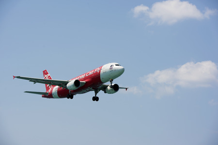Phuket - February 16, 2016: The plane was landing near Mai Khao Beach on Phuket Island in the Andaman Sea in Thailand.のeditorial素材
