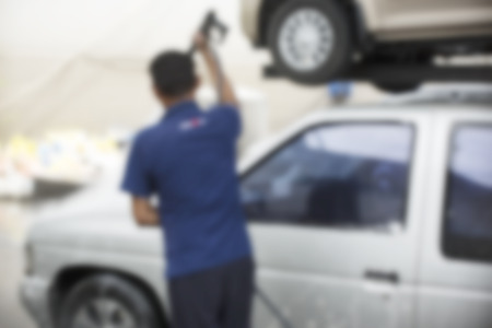 Focus blur the car wash with the injection of pressurized water to wash the carの写真素材