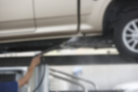 Focus blur the car wash with the injection of pressurized water to wash the carの写真素材