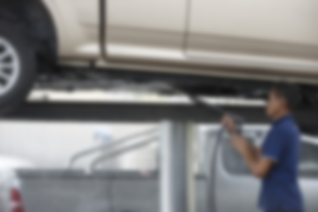 Focus blur the car wash with the injection of pressurized water to wash the carの写真素材