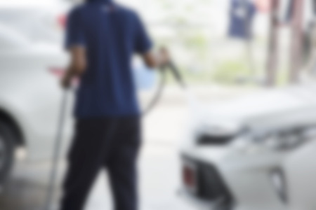 Focus blur the car wash with the injection of pressurized water to wash the carの写真素材