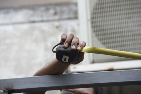 Install roof construction with stacks of roof tiles for building houses.の写真素材