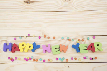 Happy New Year text in vintage letterpress wood type blocksの写真素材