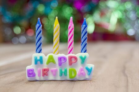 happy birthday candles on abstract backgroundの写真素材