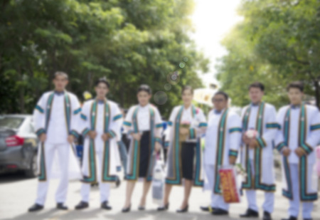 Graduation dress was photographed together with relatives at the university