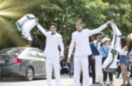 Graduation dress was photographed together with relatives at the universityの写真素材