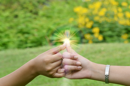 Handshake relationship with each of the natural backgroundの写真素材