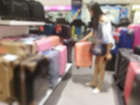 Blurred girl is shopping in department store in Thailandの写真素材